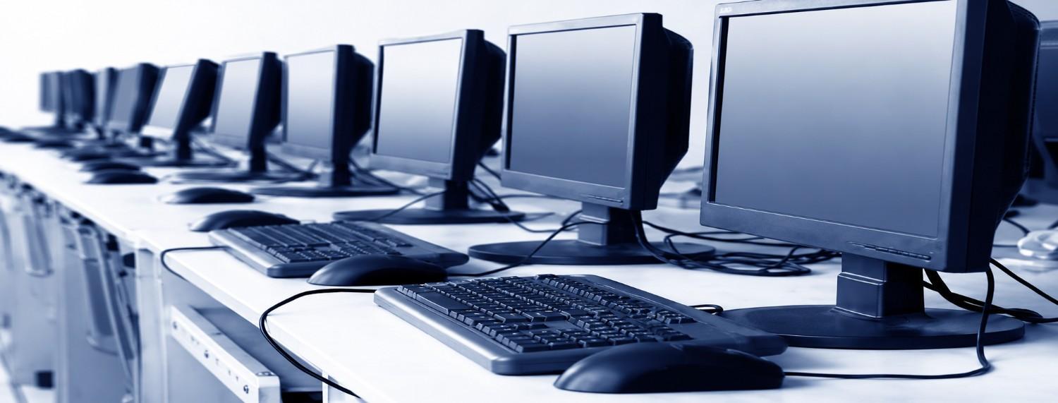 Computer skills training lab with desktop computers for digital literacy and vocational education at Indbharat Global Foundation